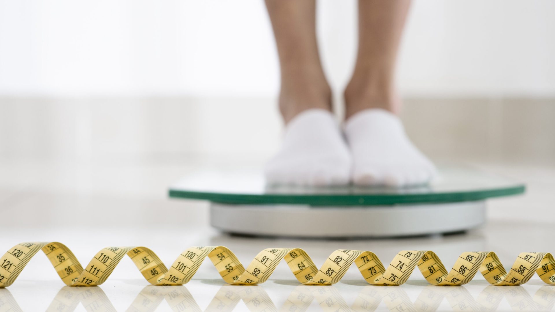 close-up-legs-weight-machine